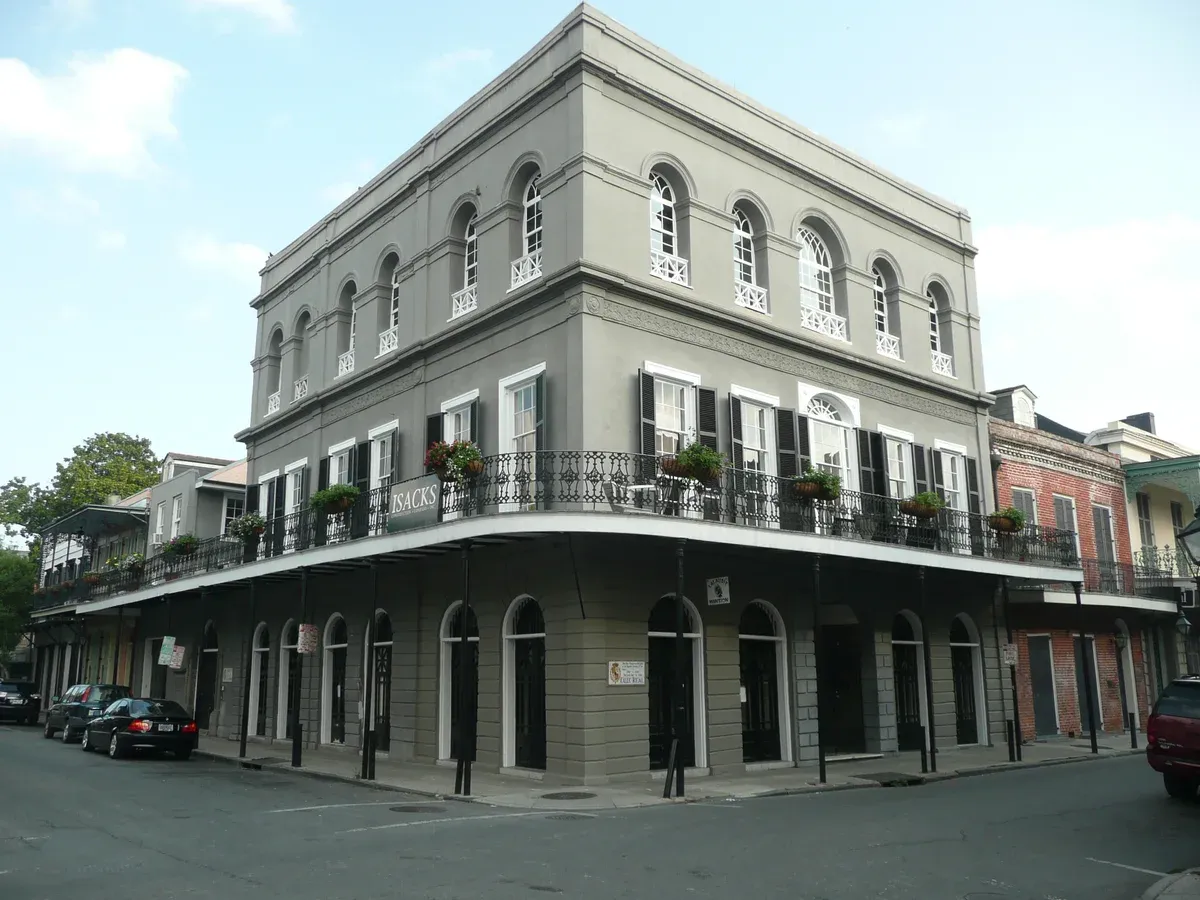 The LaLaurie Mansion at 1140 Royal Street with its cast-iron gallery, the house every New Orleans ghost tour stops outside